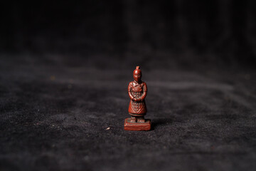 Chinese vintage chess piece portraying Terra cotta army of first emperor of China named Qin Shi...