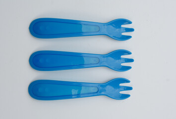 baby weaning blue plastic forks