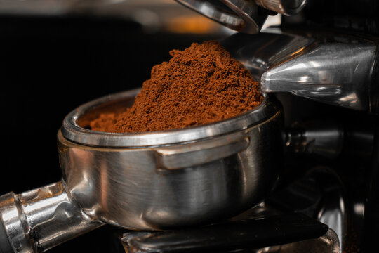 Portafilter in stainless coffee grinder