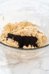 Lemon poppy seed muffins garnished with almond slivers