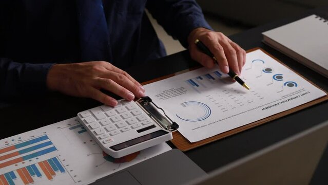 Company finance staff preparing financial documents, company finance staff preparing company finance documents to bring to the meeting to summarize for management's acknowledgment. Financial concept.