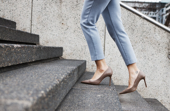 Walking, stairs and shoes of business woman for morning commute, journey and travel in city. Professional, future goals and closeup of female person for career success, work and job progress in town