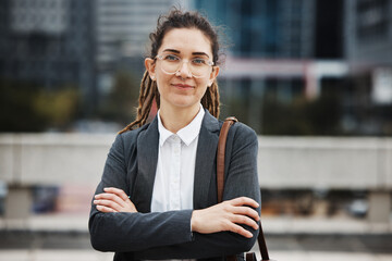 Business woman, professional portrait and arms crossed outdoor with a career and creative job...