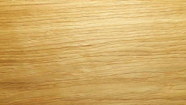 Closeup of the wood floor is made of the natural hard wood and sanded and finished with natural clear flooring stain.