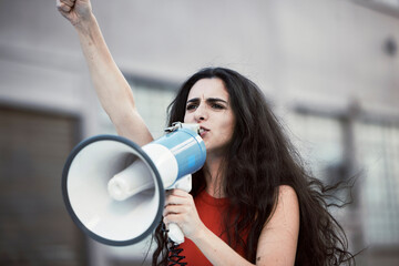 Megaphone, woman and shouting for social change, justice for equality and humanity with activist on...