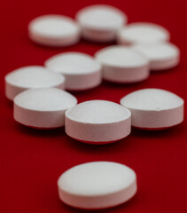 White tablets - medicines for the treatment of diseases - question mark - medication addiction