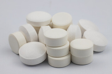 Lots of white tablets - medicines for the treatment of diseases