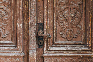 old wooden door with handle
