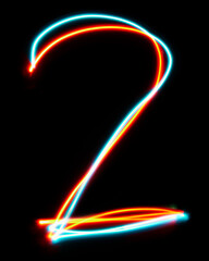 Number 2 of the alphabet made from neon sign. The blue red light image, long exposure with colored fairy lights, against a black background. Concept of design