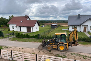 Construction Progress. Powerful Yellow Excavator in Action