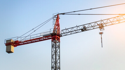 Crane for building construction, heavy machinery at construction site, equipment for architectural development