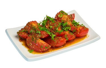 Pickled tomatoes sliced with greens on white plate. Vegetable appetizer. Isolated on transparent background