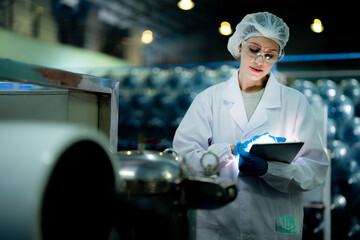 scientist worker checking the quality of Reverse osmosis machine system at the industrial factory....