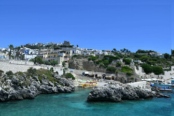 View of the small bay overlooked by a small village in the province of Lecce, Italy.