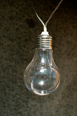 Obraz na płótnie Canvas Decotative light bulbs hanging on wire