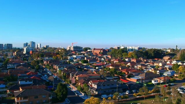 Drown view looking down on sydney residential houses in Sydney suburbia suburban house roof tops and streets  NSW Australia 