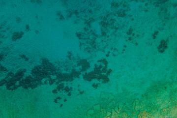 Fototapeta na wymiar Aerial top down view of crystal sea surface water background