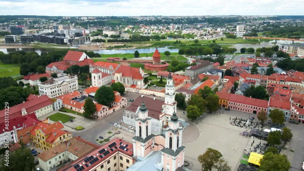 Poster Drone shot over Kaunas town hall with a town view and red houses