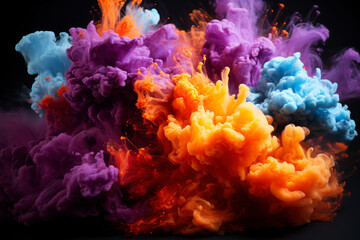 Multicolored powder, smoke and ink explode on a black background, colored abstract background