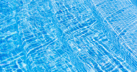 Operation and maintenance of swimming pools under sunny skies. Summer water background for...