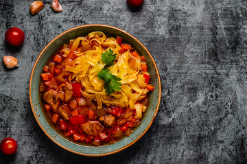 Lagman soup with lamb, homemade noodles and vegetables.