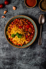 Lagman soup with lamb, homemade noodles and vegetables.