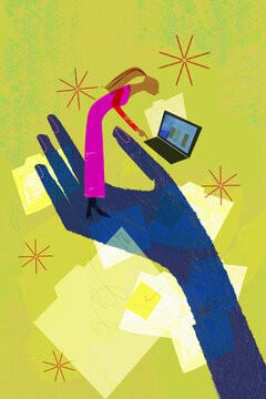 Hand supporting woman working on computer