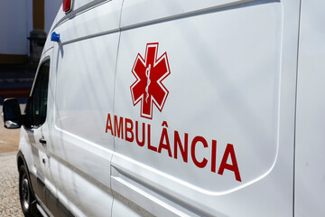 closeup of generic ambulance car description - in portuguese: ambulancia