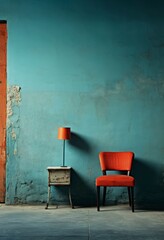 a red chair and table next to a blue wall