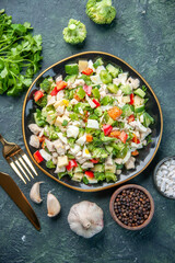 top view tasty vegetable salad inside plate with cutlery on a dark background cuisine restaurant fresh meal color health lunch diet