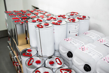 Flammable liquid in a metal canister in a storage room, research concept, handling of dangerous...