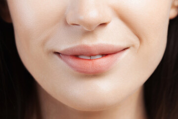 Obraz premium Lips of young beautiful white woman closeup
