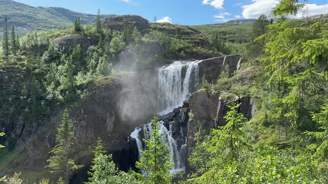 Waterfall in the Jordbru river in Grane municipality, Nordland county	
