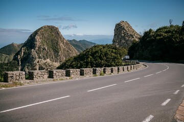 Scenic road and mountain with some rocks on both sides, La Gomera, Canary Islands, Spain