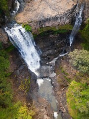Bousra waterfall with long exposure in the daylight in Cambodia