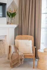 Spacious living room with a comfortable armchair and a flat screen television, creating a cozy space