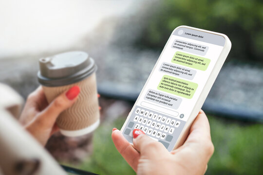 Woman texting with phone outdoors. Text message with smartphone