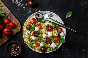 Pasta with mozzarella and tomatoes .Pasta caprese
