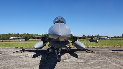Grounded Power: F-16 Fighter Jet Photoshoot with Aviation Enthusiast
