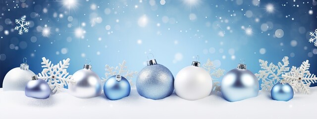 Winter snowy background with Christmas toys, snowdrifts, with beautiful light and snow flakes on the blue sky in the evening, banner format, copy space. Christmas decoration