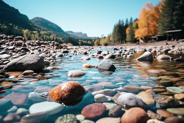 Foto op Canvas collection of happy boulders and rocks resting in crystal-clear fresh water, creating a tranquil and picturesque scene, autumn nature  © Chiaa