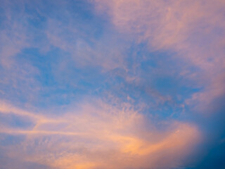 Naklejka na ściany i meble Colorful cloudy twilight evening sky for background