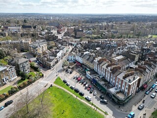 Terraced houses overlooking green Blackheath London UK drone aerial view