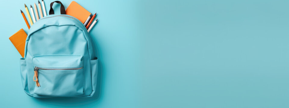 Back to school concept. Backpack with school supplies on blue background. Top view. Copy space. Created with Generative AI technology.