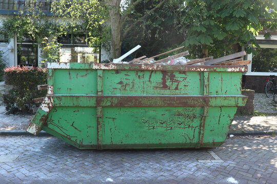 Loaded garbage dumpster