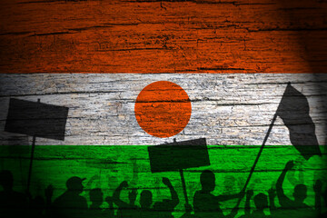 Republic of Niger flag painting on wood and peoples shadow