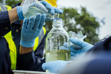 Environmental researchers investigate the condition of canal water for toxic spills, river waste...