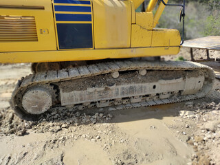 Fototapeta na wymiar crawler excavator close-up on a construction site