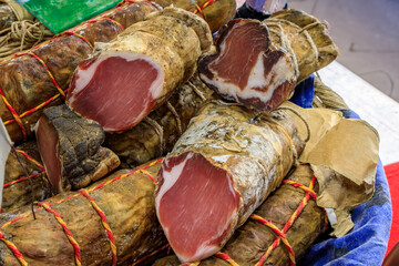 Lonzo, Corsican dry cured ham from Nustrale breed pork loin for sale at a local covered provencal...