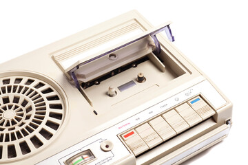 Retro portable stereo cassette tape recorder from 80s. English translation: recording, start-up,...